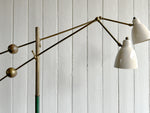 A 1950's Italian Two Arm Articulated Standing LampA 1950's Italian Two Arm Articulated Standing Lamp