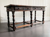 A 17th Century French Walnut Sideboard with Decorative Carved Drawer Fronts
