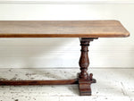 A Single Plank Walnut Top Italian Baroque Trestle Table - 9' Long