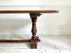 A Single Plank Walnut Top Italian Baroque Trestle Table - 9' Long