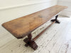 A Single Plank Walnut Top Italian Baroque Trestle Table - 9' Long