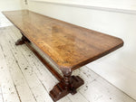 A Single Plank Walnut Top Italian Baroque Trestle Table - 9' Long