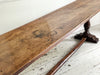 A Single Plank Walnut Top Italian Baroque Trestle Table - 9' Long