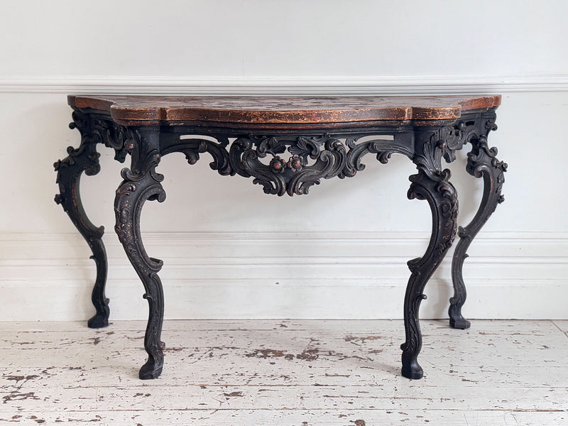 An 18th C Italian Rococo Console Table with Giallo Antico Top