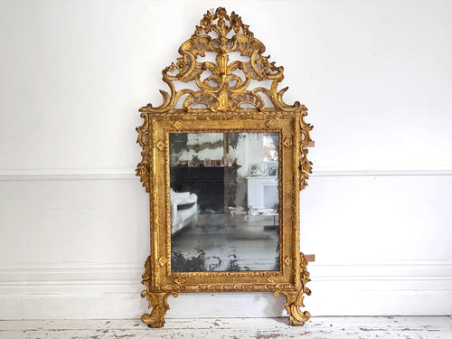 An 18th C Italian Piedmont Carved Giltwood Mirror
