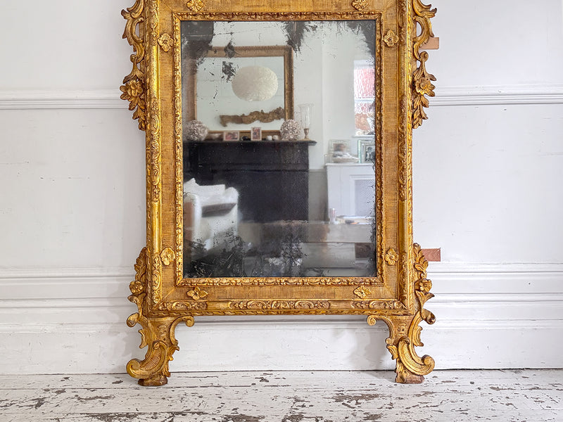 An 18th C Italian Piedmont Carved Giltwood Mirror