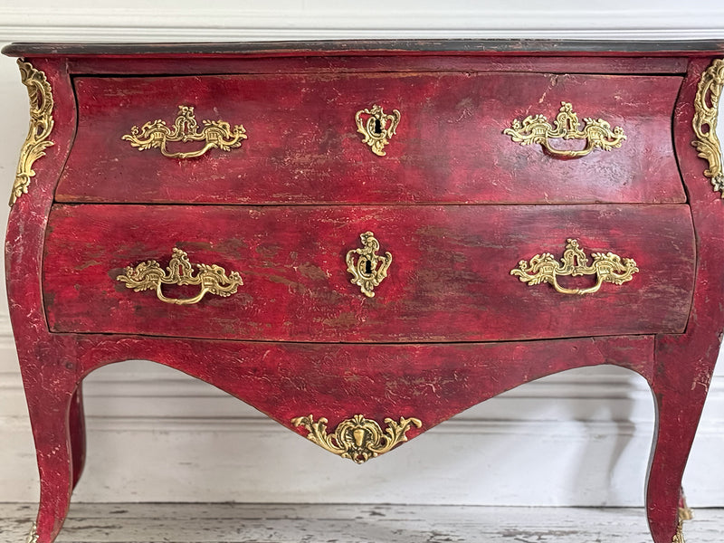 An 18th C French Red Bombe Commode with Original Brass Fixings