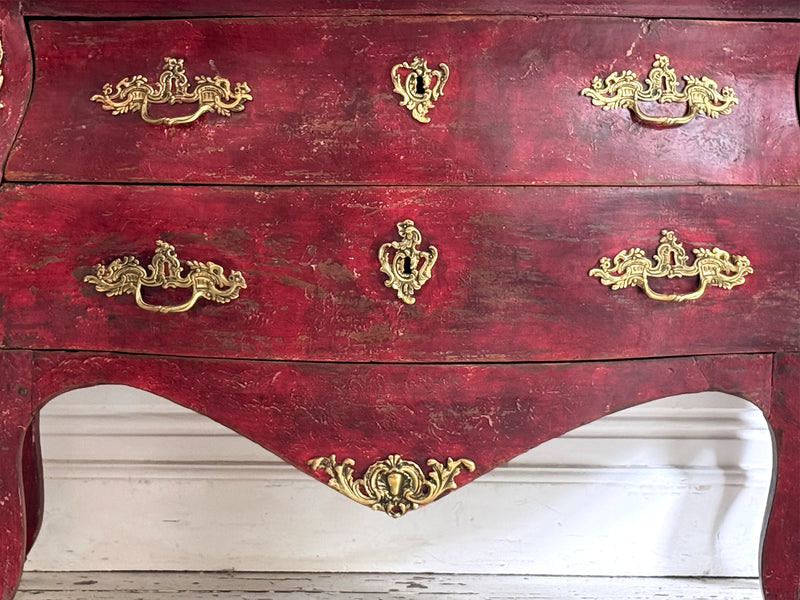 An 18th C French Red Bombe Commode with Original Brass Fixings