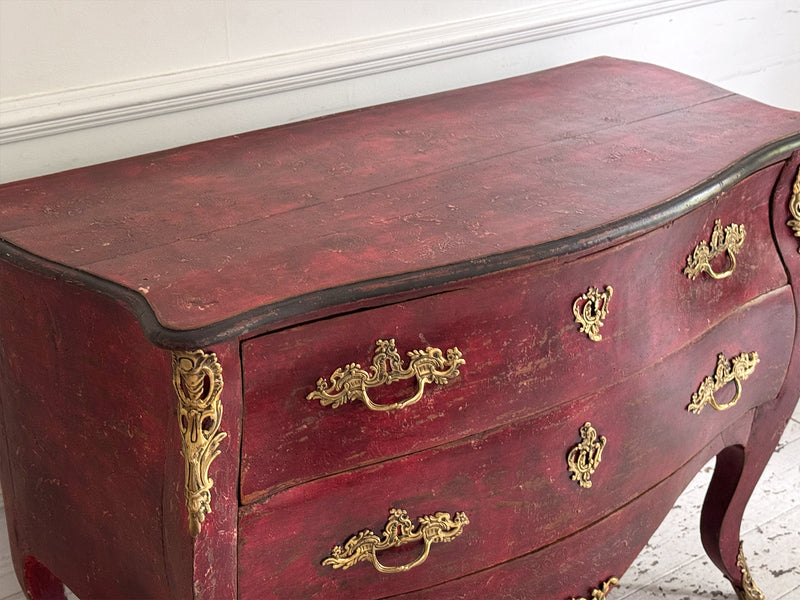 An 18th C French Red Bombe Commode with Original Brass Fixings