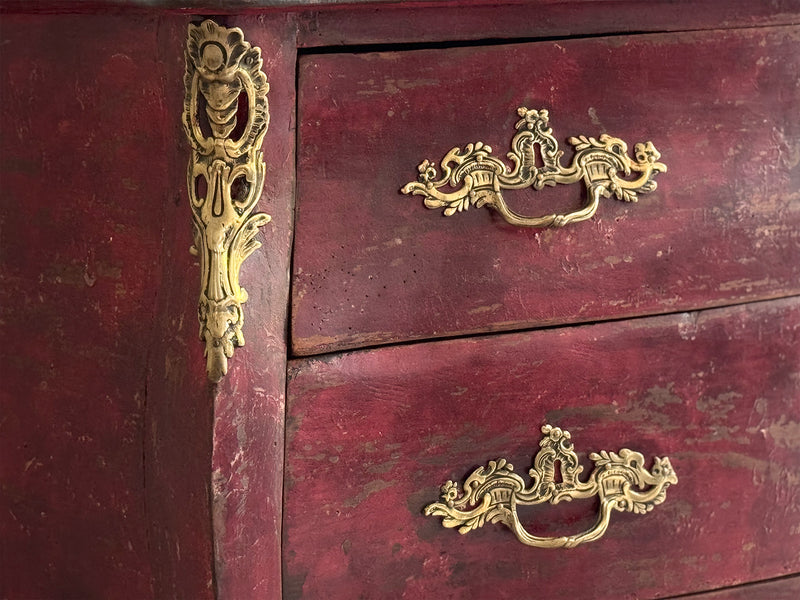 An 18th C French Red Bombe Commode with Original Brass Fixings
