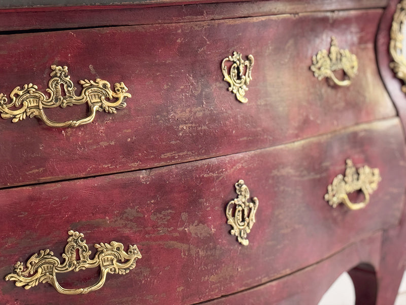 An 18th C French Red Bombe Commode with Original Brass Fixings