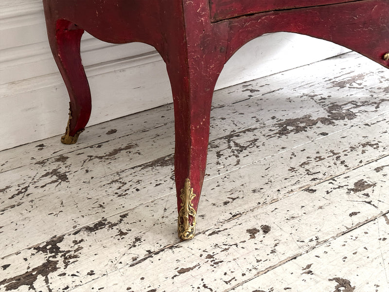 An 18th C French Red Painted Bombe Commode with Original Brass Handles