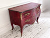An 18th C French Red Bombe Commode with Original Brass Fixings