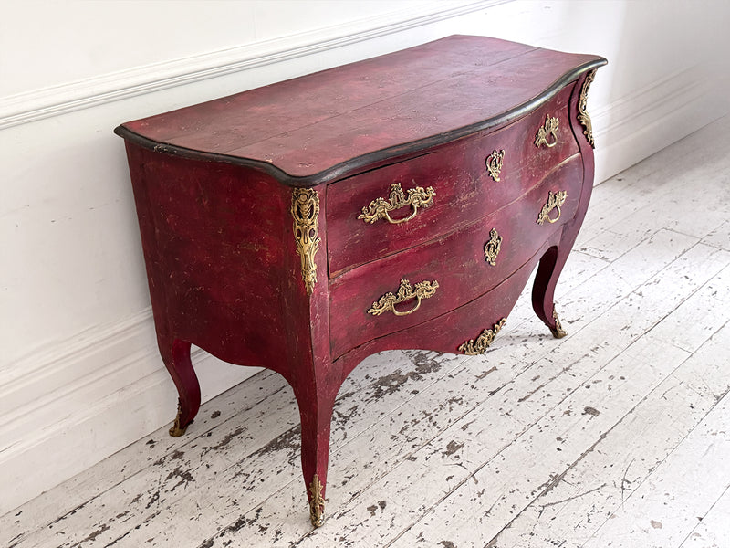 An 18th C French Red Bombe Commode with Original Brass Fixings
