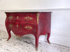 An 18th C French Red Painted Bombe Commode with Original Brass Handles