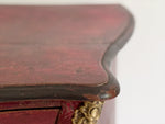 An 18th C French Red Bombe Commode with Original Brass Fixings