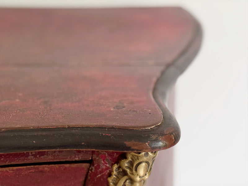 An 18th C French Red Bombe Commode with Original Brass Fixings