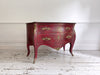 An 18th C French Red Bombe Commode with Original Brass Fixings