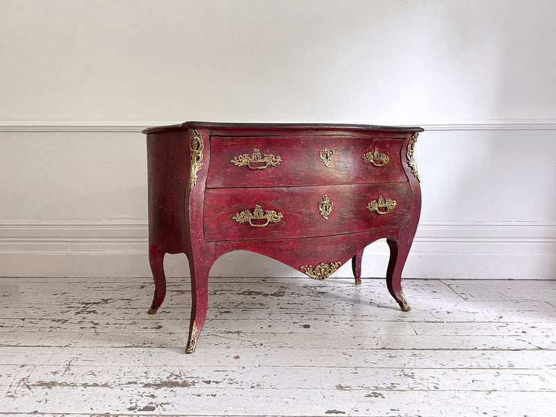 An 18th C French Red Bombe Commode with Original Brass Fixings