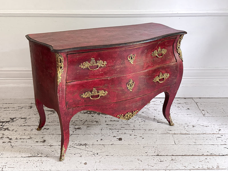 An 18th C French Red Bombe Commode with Original Brass Fixings