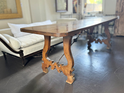 An 18th C Spanish Single Plank Walnut Top Dining Table with Ironwork Beneath