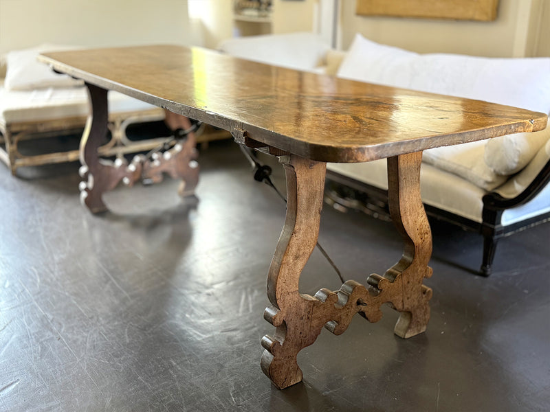 An 18th C Spanish Single Plank Walnut Top Dining Table with Ironwork Beneath