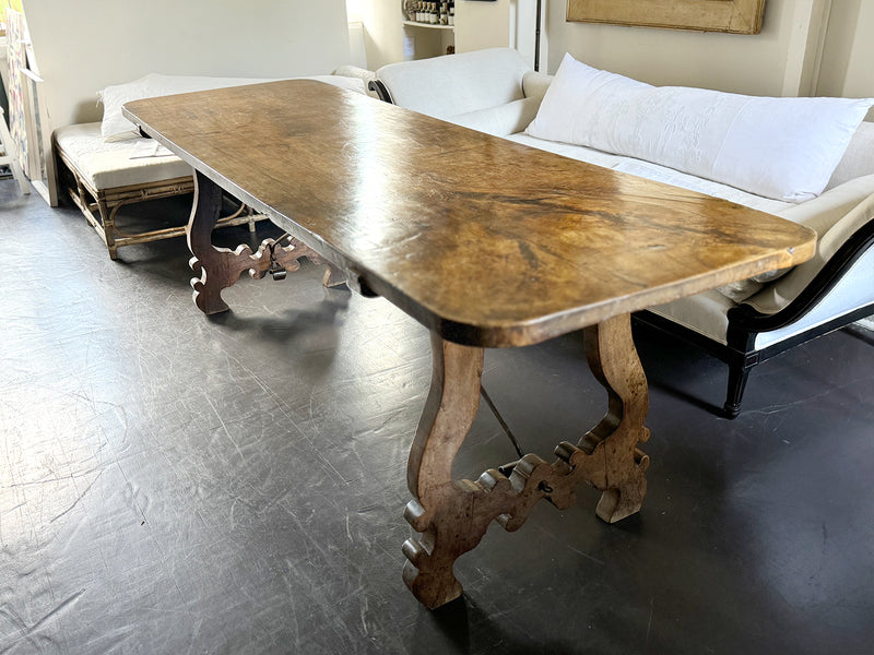 An 18th C Spanish Single Plank Walnut Top Dining Table with Ironwork Beneath