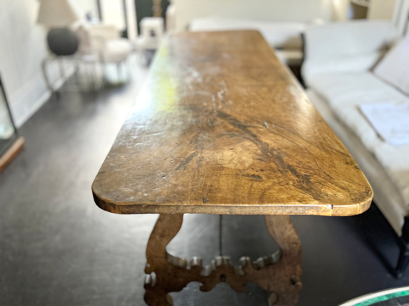 An 18th C Spanish Single Plank Walnut Top Dining Table with Ironwork Beneath