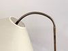 A 1950's French Adjustable Brass Reading Lamp with Parchment Shade