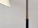 A 1950's French Adjustable Brass Reading Lamp with Parchment Shade