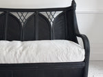 A 1950's French Black Rattan Sculptural Sofa with Piqué Upholstery