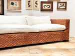 A 1970's French Raffia Rattan Three Seater Sofa