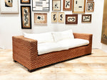 A 1970's French Raffia Rattan Three Seater Sofa