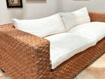 A 1970's French Raffia Rattan Three Seater Sofa