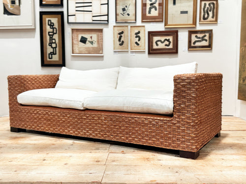 A 1970's French Raffia Rattan Three Seater Sofa