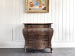 A 1970's French Rattan Bombe Commode
