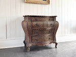 A 1970's French Rattan Bombe Commode