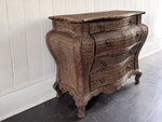 A 1970's French Rattan Bombe Commode