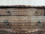 A 1970's French Rattan Bombe Commode