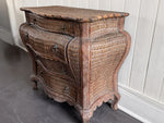 A 1970's French Rattan Bombe Commode