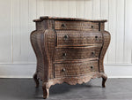 A 1970's French Rattan Bombe Commode