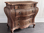 A 1970's French Rattan Bombe Commode
