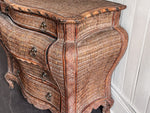 A 1970's French Rattan Bombe Commode