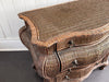 A 1970's French Rattan Bombe Commode