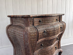 A 1970's French Rattan Bombe Commode