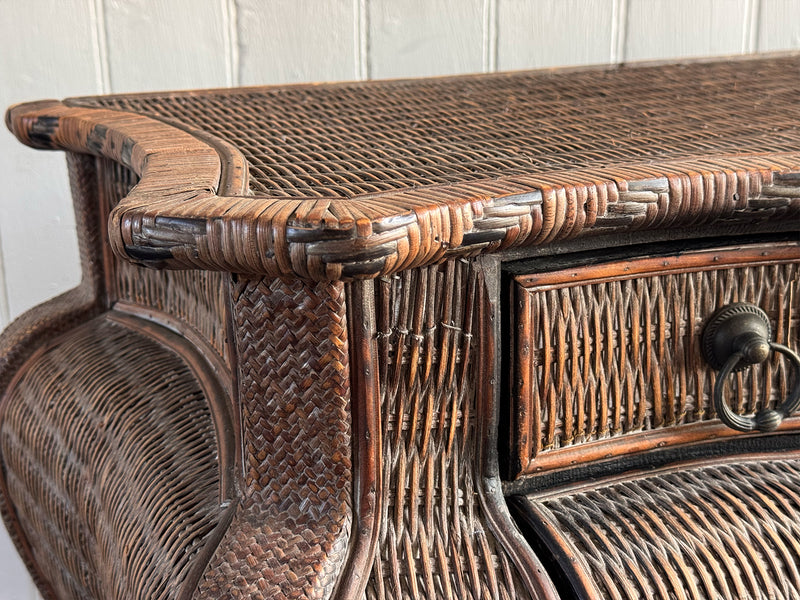 A 1970's French Rattan Bombe Commode