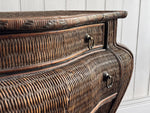 A 1970's French Rattan Bombe Commode