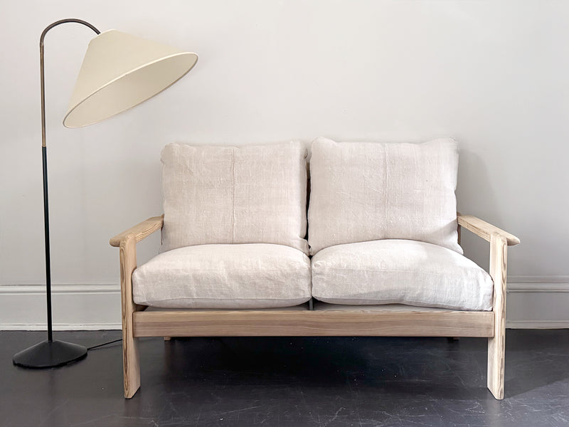 A 1970's French Two-Seater Pine Sofas with French Linen Upholstery