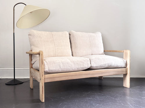 A 1970's French Two-Seater Pine Sofas with French Linen Upholstery