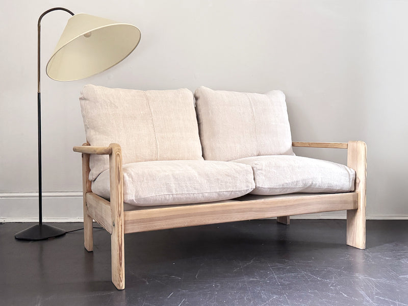 A 1970's French Two-Seater Pine Sofas with French Linen Upholstery